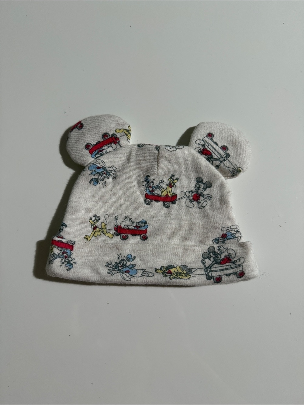 Disney White Baby Hat with Red, Blue and Yellow Cartoon Print Sz Newborn